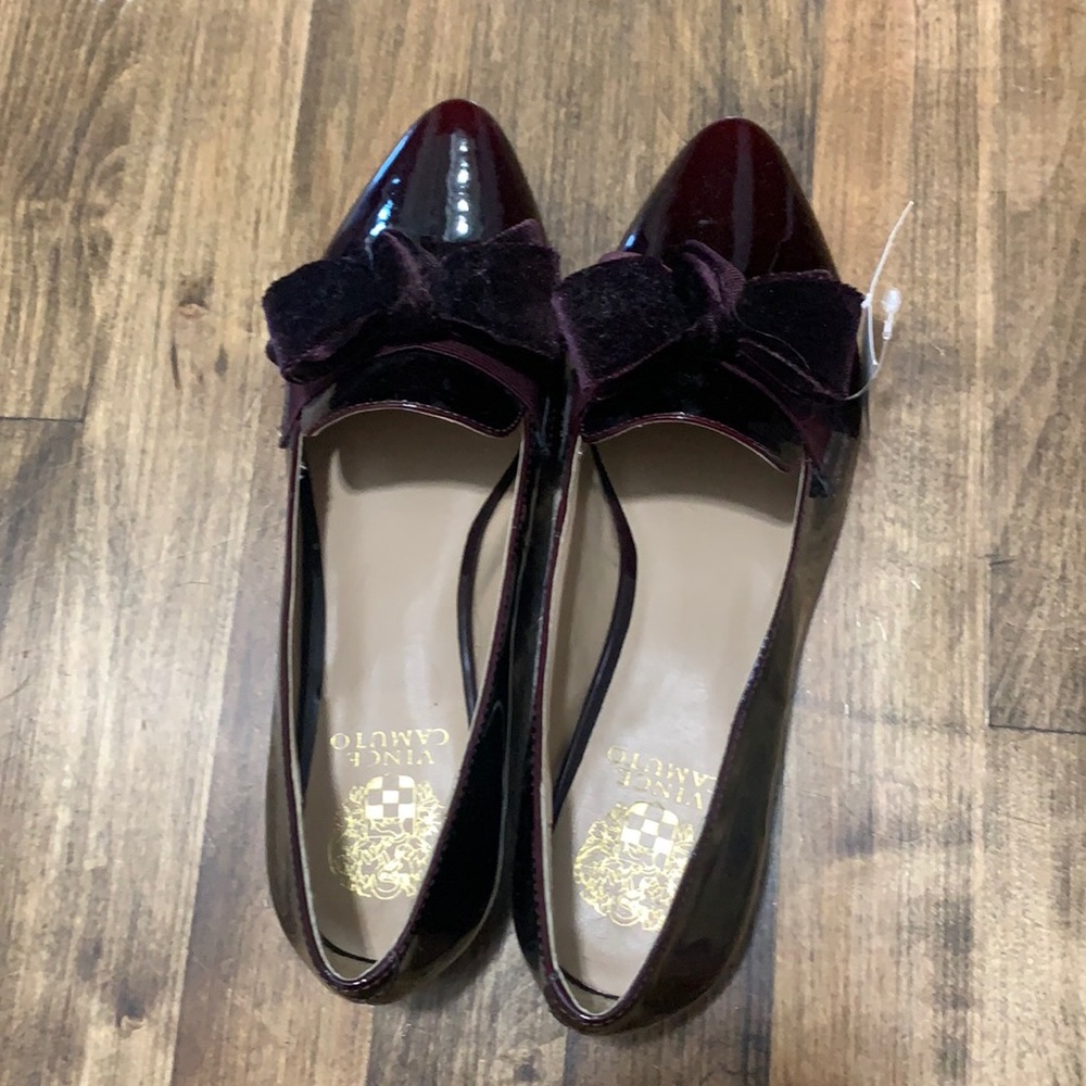 Size 8 Vince Camuto burgundy pointy toe loafers with bow. New, never worn